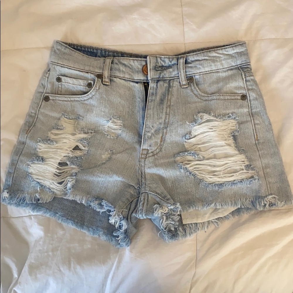 light washed ripped jean shorts